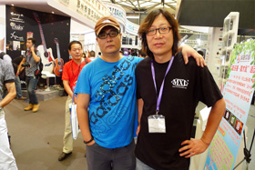 with guitar builder Quanwu Sun